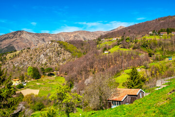 Springtime view of the hills of the Ligurian hinterland, behind the city of Genoa (Ligurian Region, Northern Italy).