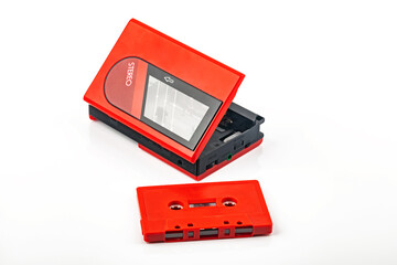 Vintage audio cassette player with red cassette