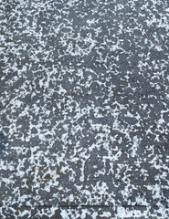 Rain splatter on concrete.