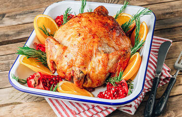 Festive celebration roasted chicken with Pomegranate and Orange