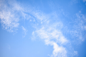 Fototapeta na wymiar blue sky with little white clouds