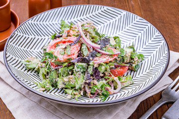 vegetable salad with nuts, georgian cuisine on wooden table