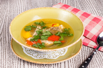 Khashlama with lamb and vegetables on old wooden table