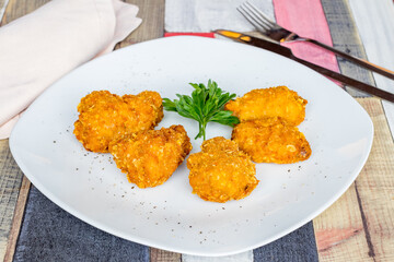 Buffalo chicken wings on a white plate