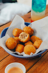 Colorful Food Beach Appetizer Starts Snacks Fresh Delicious Menu Recipe Meal Meat Chicken Fries Fish Seafood Beer on a wooden table