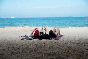 Happy Young cute couple at sea on paradise tropical beach, honeymoon, vacation, travel concept