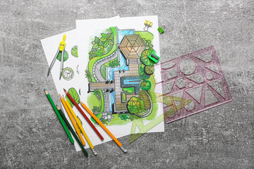Paper sheets with sketches for landscape design and stationery on grunge background