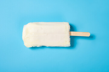 milk shake popsicle on a blue background