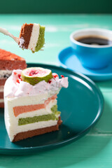 eating sweet cakes and cup of coffee vertical composition