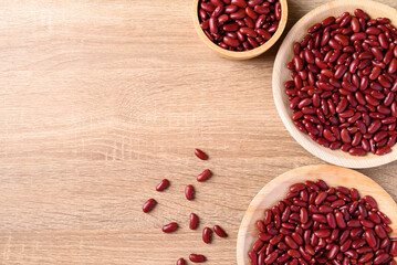 Red kidney bean on wooden background, Table top view