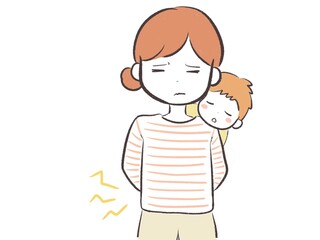 腰痛に悩む子育て中のお母さん