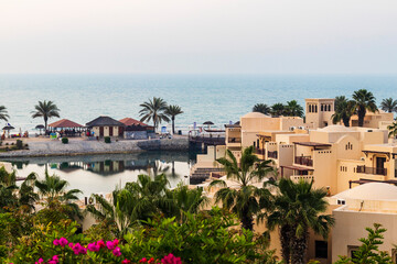 Ras Al Khaimah, UAE - 04.04.2022 - View of the beach and private villas at The Cove Rotana Resort....