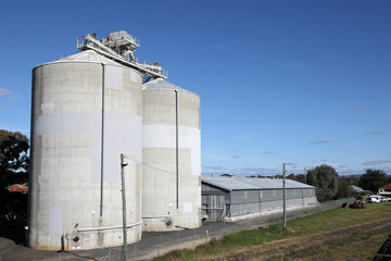 Railway yard and station in the Queensland town of Warwick in Southern Downs Region, featuring buildings, silos and carriages
