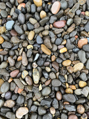 Assorted smooth stones outside.