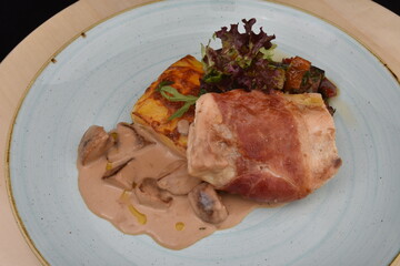 Gourmet Venison  with salad and mushrooms sauce