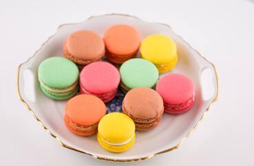 Multi coloured macarons on white