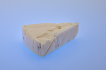 Cheese triangles on a reflective surface,Processed cheese