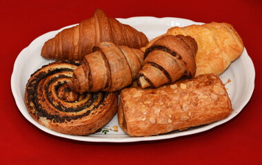 porcelain platter with Croissants, donuts, crullers
