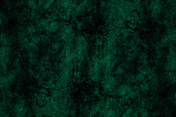 Scratched dark green old concrete wall surface with heavy grunge texture for background