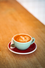 Latte coffee on wood table