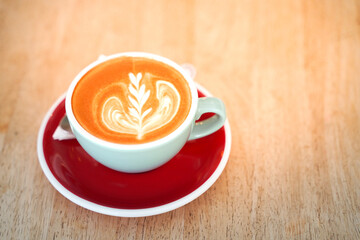 Latte coffee on wood table