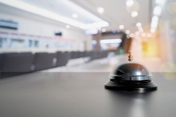 Hotel service bell on black table. Concept hotel