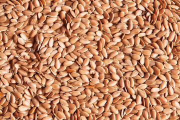 Flax seeds close-up. Macro photo. View from above. Flat lay.