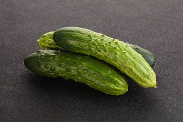 Fersh juicy green cucumbers heap