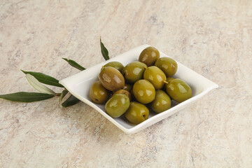 Tasty marinated olives in the bowl
