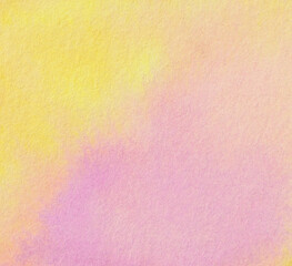 水彩で描かれたピンクとイエローのにじみ模様