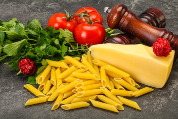 Raw penne rigate for cooking