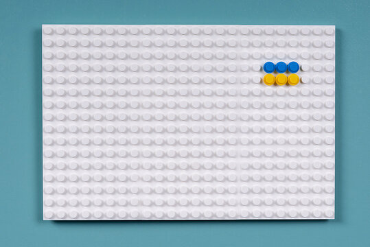 Zaporozhye, Ukraine, April 19, 2022. flag of ukraine from lego on an azure background. Kyiv Europe. concept blank for text