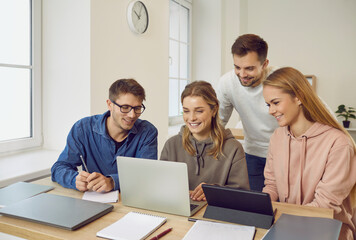 Smiling diverse students use computer have webcam class or conversation on internet. Happy young...