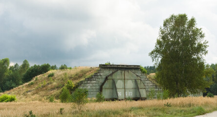 Abandoned cold war Soviet era concealed military aircraft hangar, Mimoň, Czech Republic