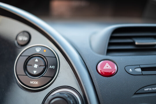 Red Emergency Button Light In A Dark Car Cockpit