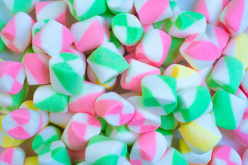 Background or texture of colorful blue and pink marshmallows.Multi-colored marshmallows.