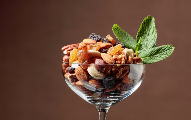 Nuts and raisins garnished with mint.