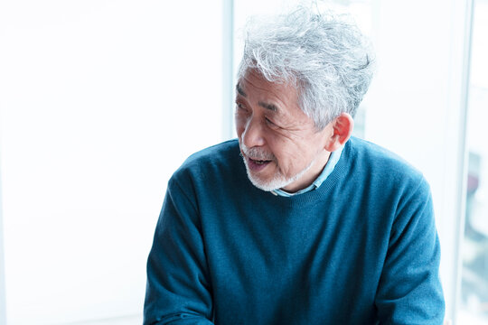 Elderly Man Advising