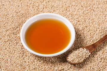 Sesame Oil in a glass bowl background