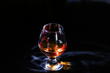 whiskey glass on a dark background