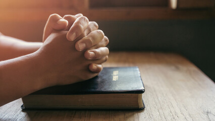 Christians sit and pray to God in the morning.