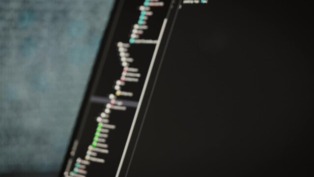 Software development in a special editor. On laptop screen code and application interface.
