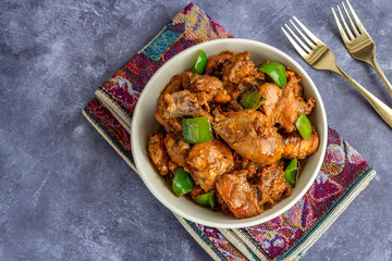 Indian Stir-Fried Chicken in a Bowl Directly Above Photo