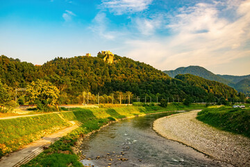 Picturesque view of river Savinja and castle hill in Celje, Slovenia