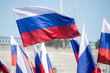 Russia flag isolated on the blue sky with clipping path. close up waving flag of Russia. flag symbols of Russia.
