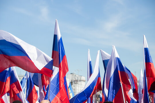 Russia flag isolated on the blue sky with clipping path. close up waving flag of Russia. flag symbols of Russia.