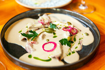 Braised beef cheeks with creamy sauce