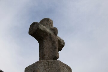 stone cross on the cemetery
