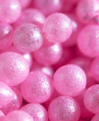 Small sweet pink balloons as a background.