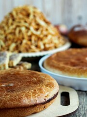 Traditional Easter dishes with homemade cakes on an ancient wooden table. Healthy homemade food.